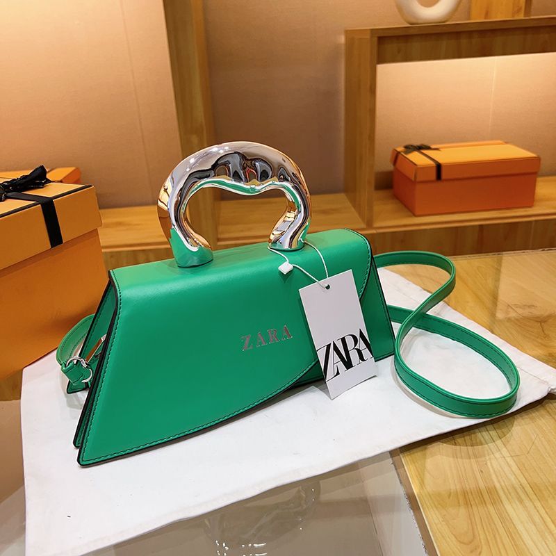 Trendy Green Top‑Handle Mini Bag with Silver Metal Handle & Crossbody Strap