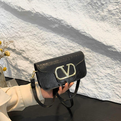 Classic Black Crossbody Sling Bag with Bold Gold “V” Logo