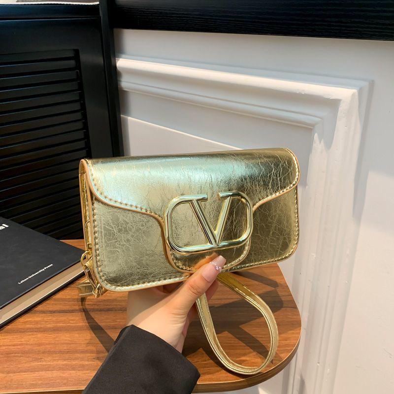 Classic Black Crossbody Sling Bag with Bold Gold “V” Logo