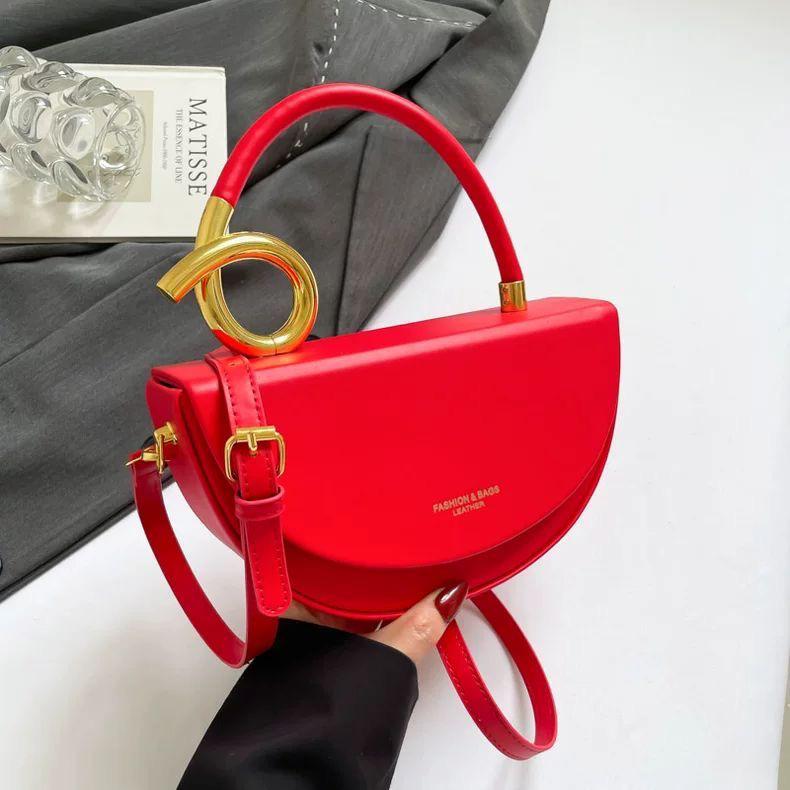 Chic Nude Half‑Moon Handbag with Gold Spiral Handle & Crossbody Strap