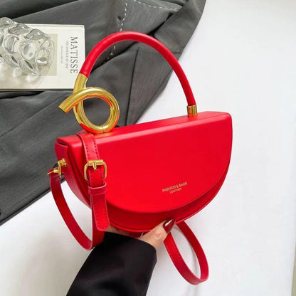 Chic Nude Half‑Moon Handbag with Gold Spiral Handle & Crossbody Strap