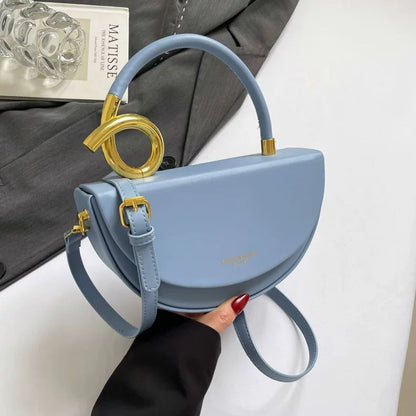 Chic Nude Half‑Moon Handbag with Gold Spiral Handle & Crossbody Strap