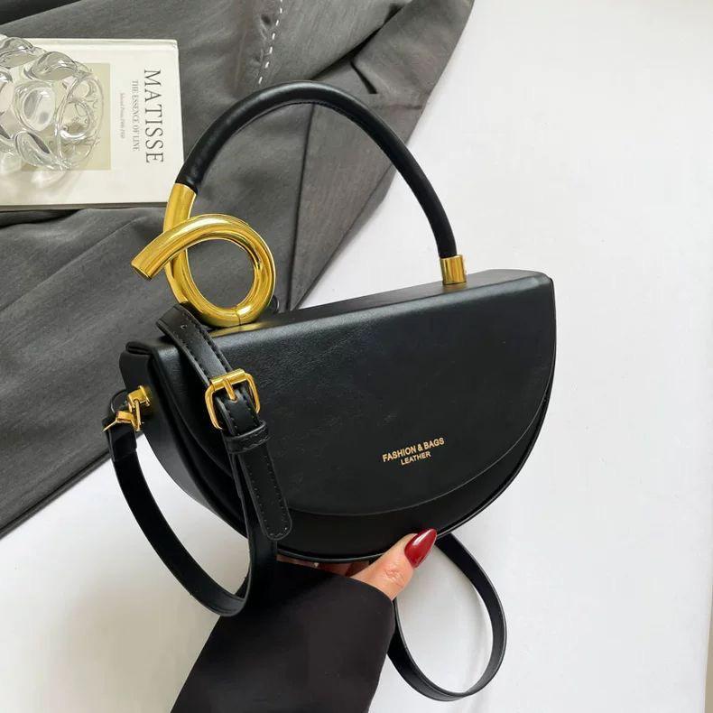 Chic Nude Half‑Moon Handbag with Gold Spiral Handle & Crossbody Strap