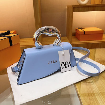 Trendy Green Top‑Handle Mini Bag with Silver Metal Handle & Crossbody Strap