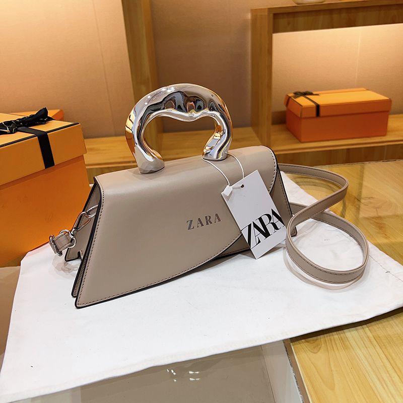Trendy Green Top‑Handle Mini Bag with Silver Metal Handle & Crossbody Strap